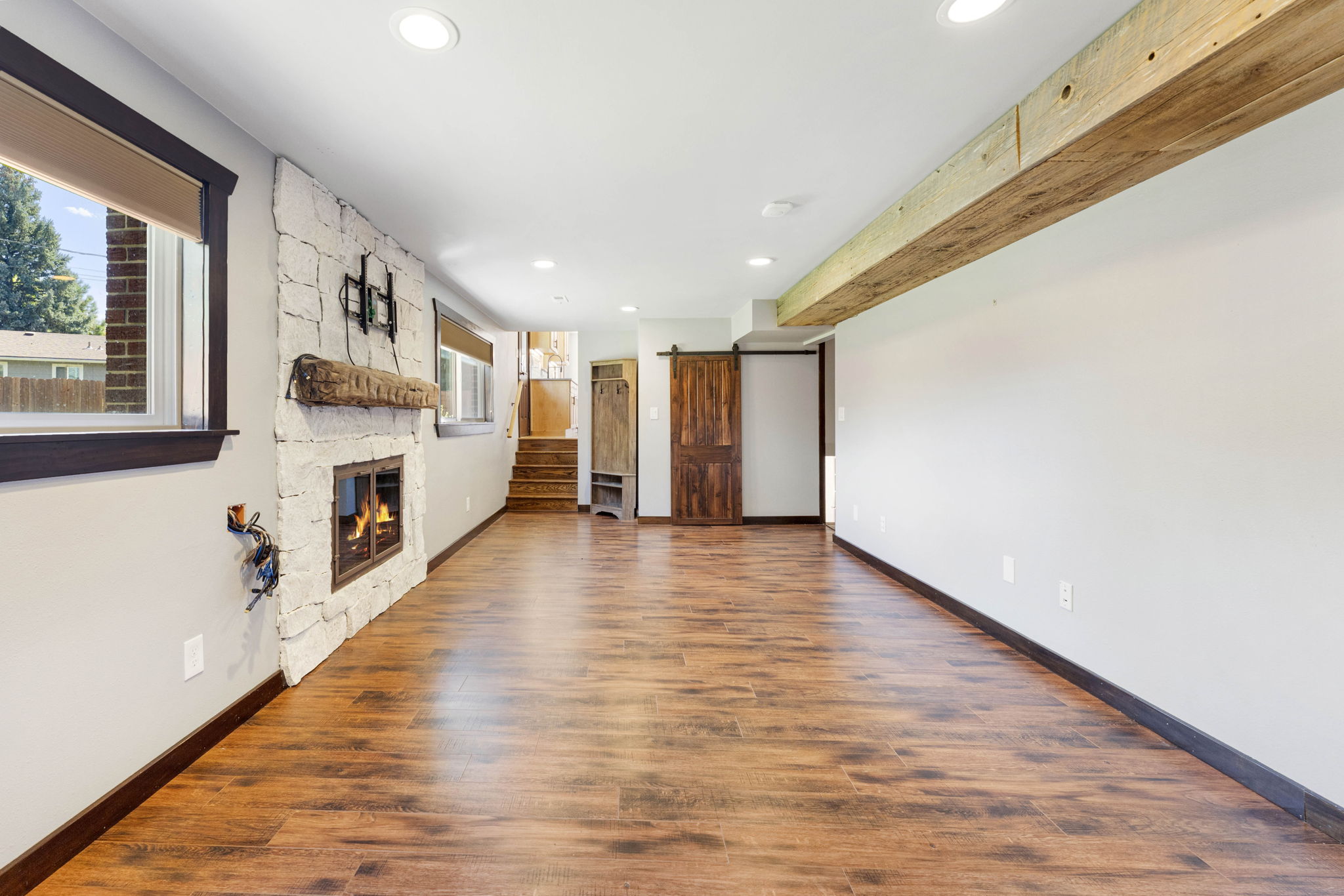 Family Room with Rustic Style Finishes