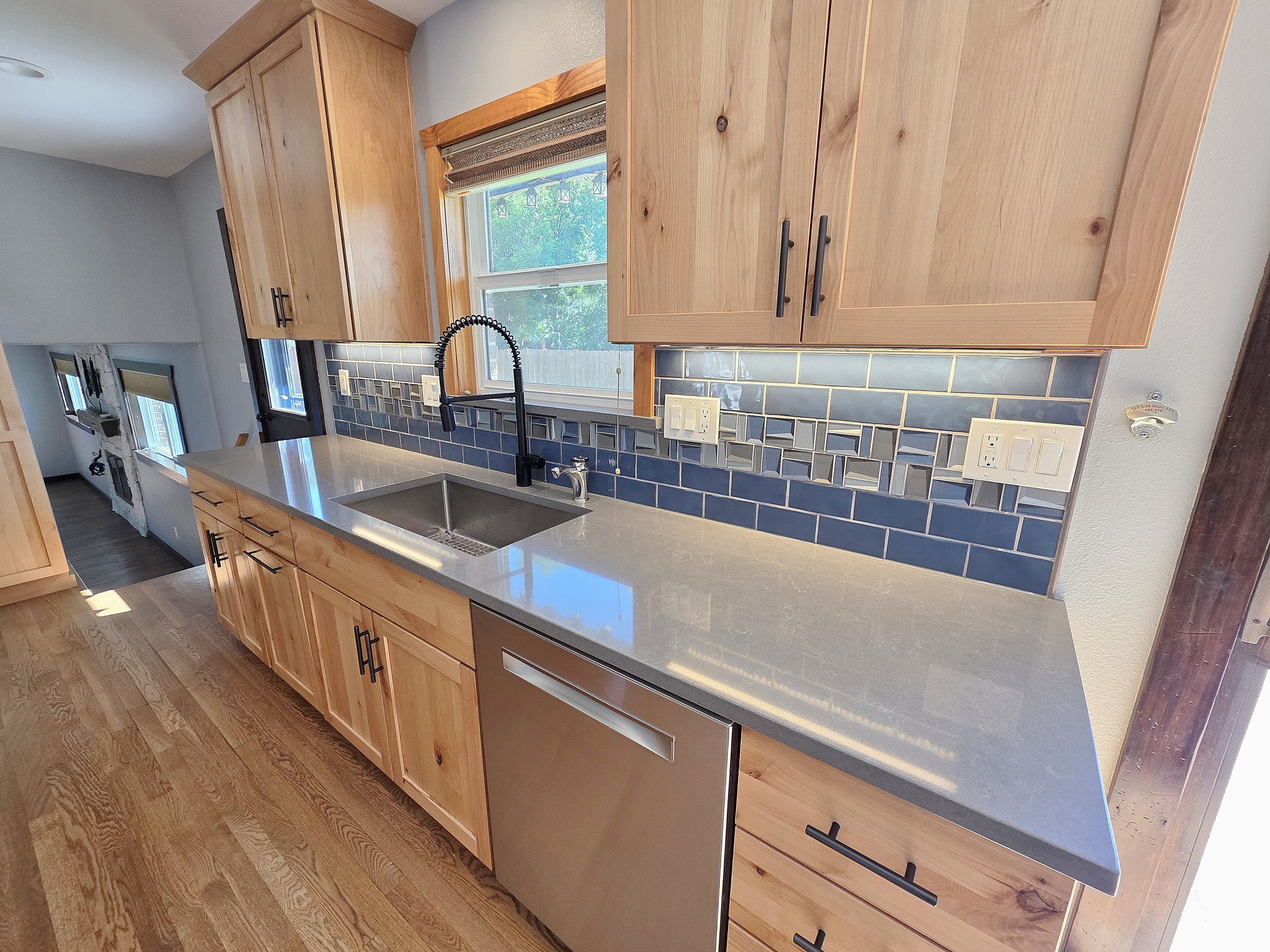 Knotty Hickory Cabinetry & Quartz Counters