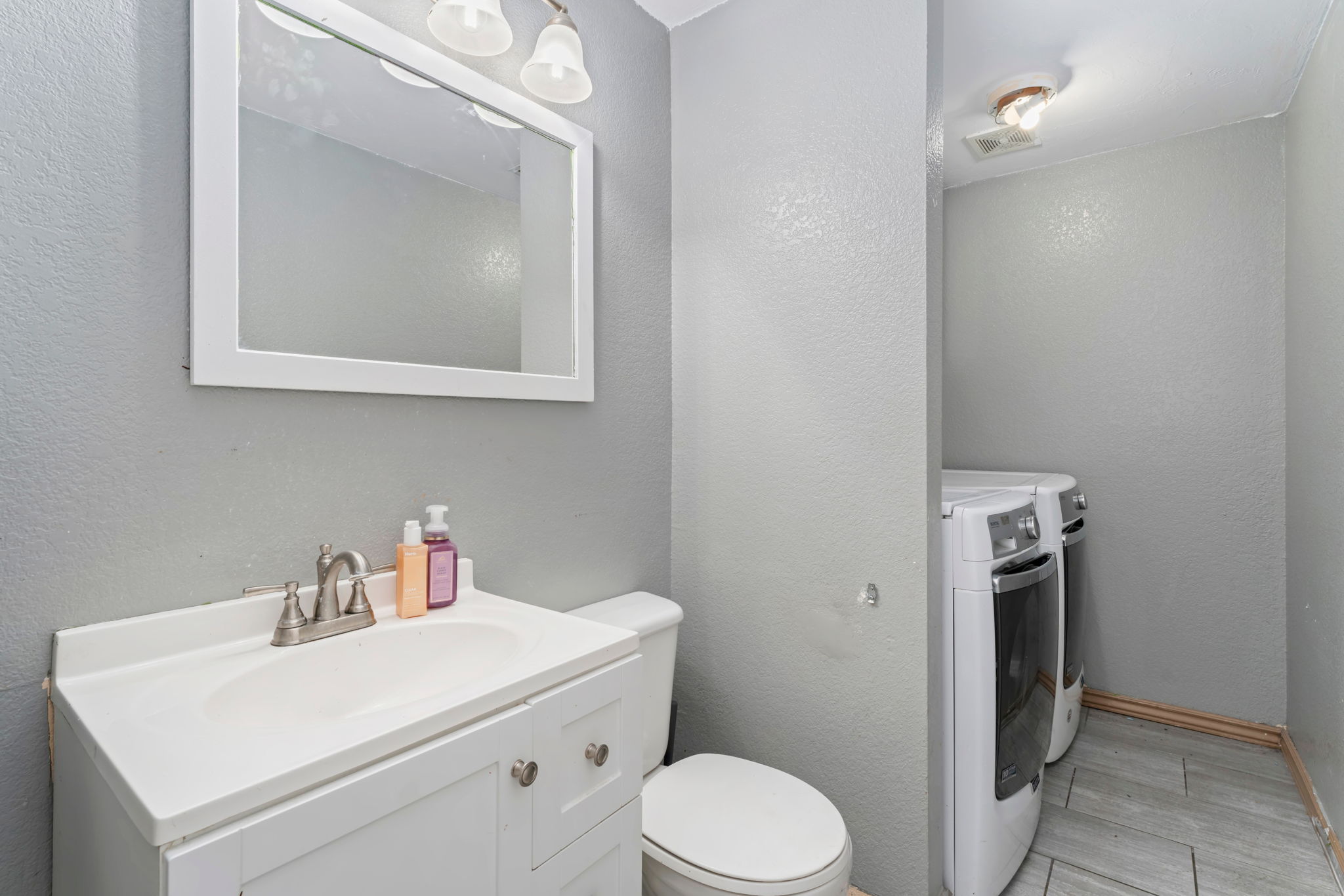 Lower Level - Bathroom/Lower Level - Laundry