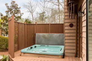 Secluded hot tub with louvered wall that can be closed for privacy!