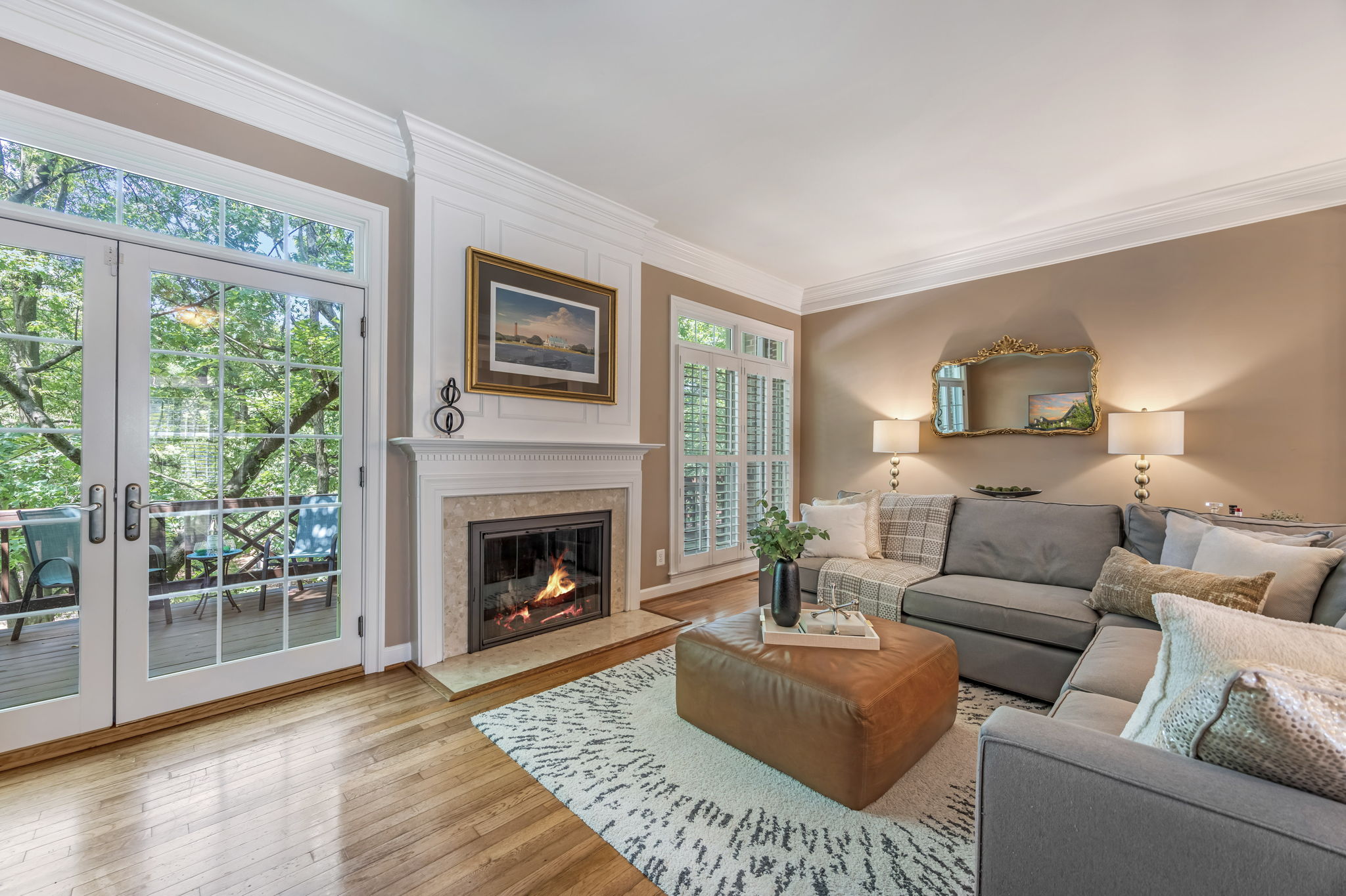 Living Room with fireplace and doors to deck