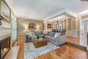 Living Room with fireplace and doors to deck