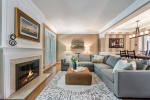 Living Room with fireplace and doors to deck