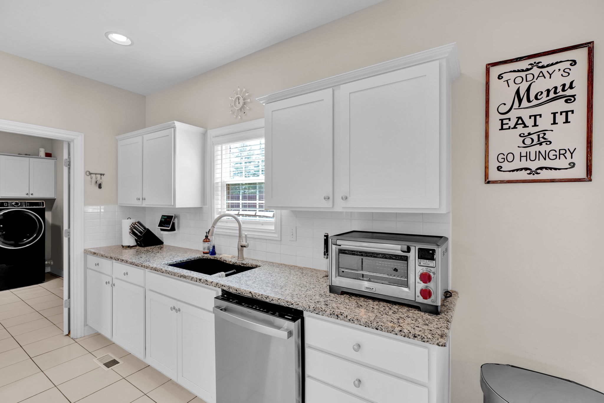 Plenty of counter tops and cabinets