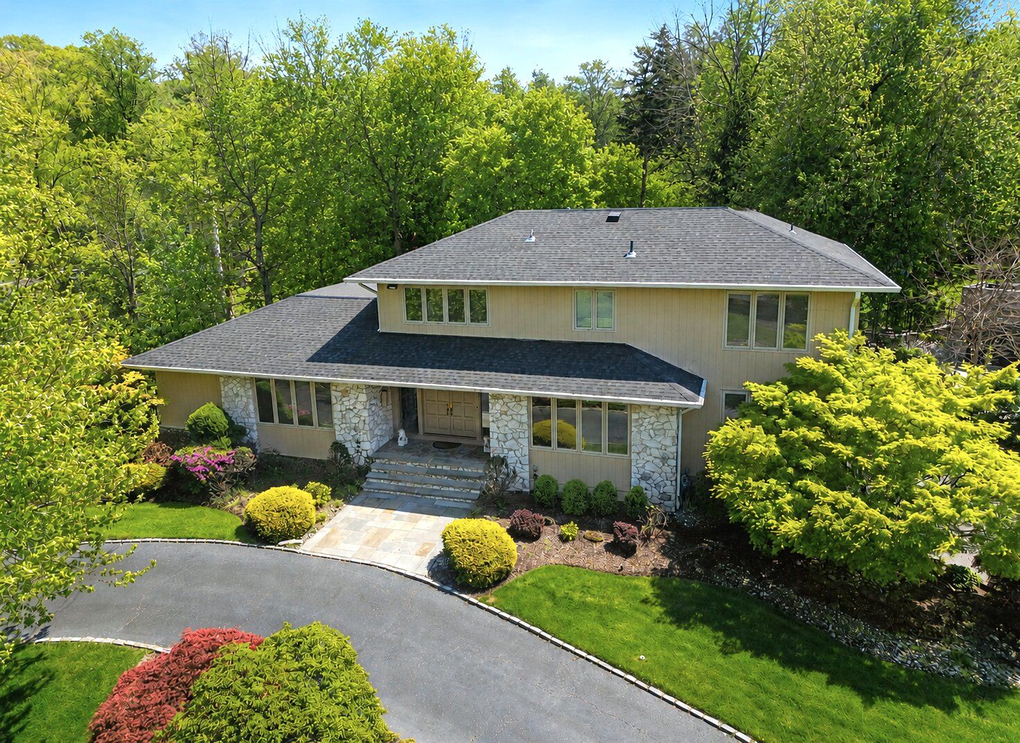 Welcome to this sprawling custom home in the desirable Deerfield neighborhood.