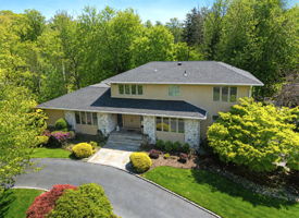 Welcome to this sprawling custom home in the desirable Deerfield neighborhood.