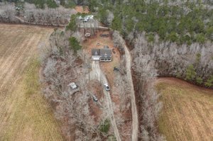 Aerial view showing long driveway