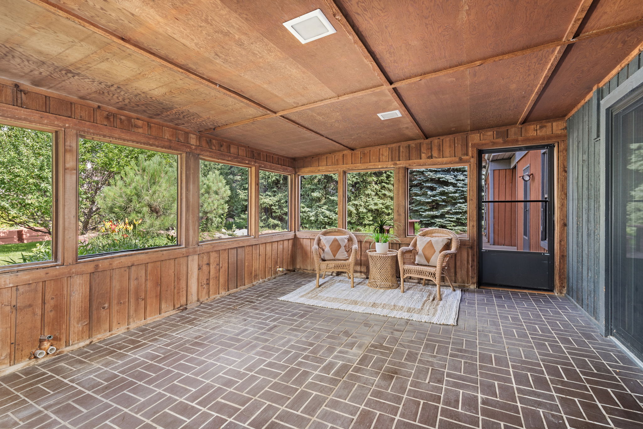 The Enclosed Patio Conveniently Connects to the Family Room and the Outdoor Patio in the Back Yard