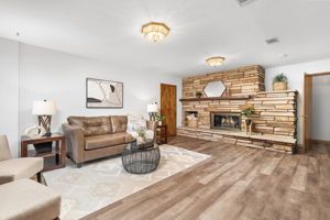 The Family Room Has a Second Stone Fireplace