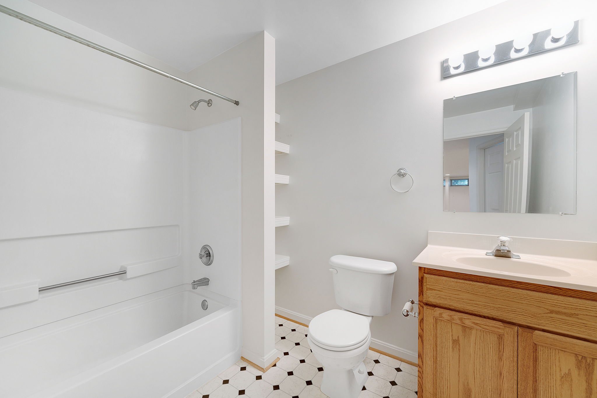 Additional Full Bath w/ Built-In Linen Shelves