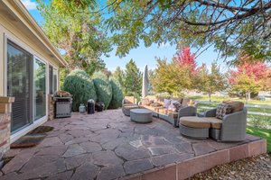 Flagstone patio with mature trees