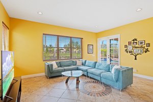 Family Room with access to pool patio thru the French doors