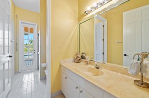 Cabana bath leading to pool patio