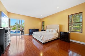 Volume ceilings and view of pool & lake