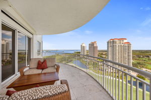 Balcony off Family Room shows off the architectural pleasing curved lines