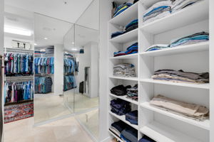 Custom closet with full length dressing mirror