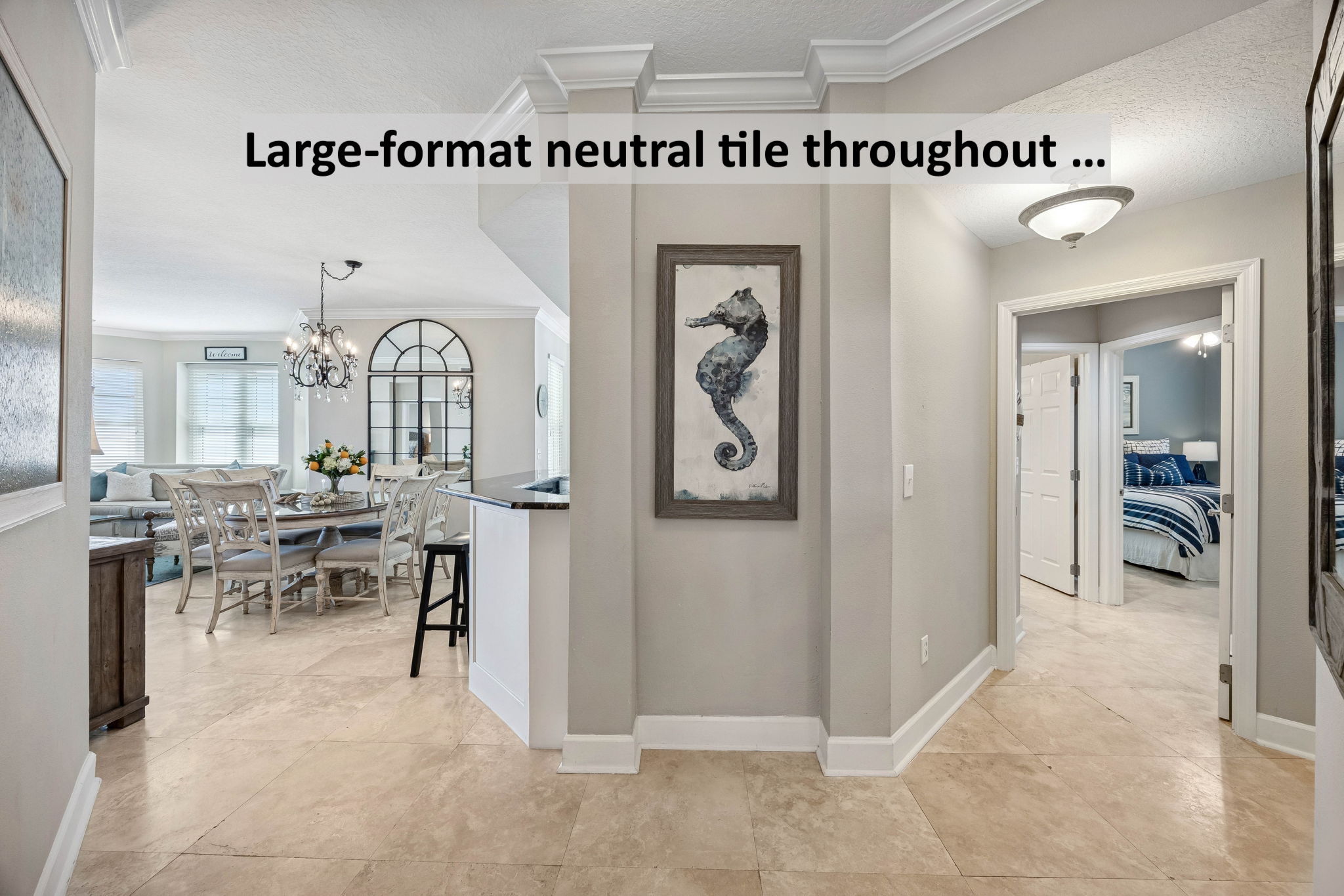 ... where large-format travertine tile creates a polished, cohesive backdrop.