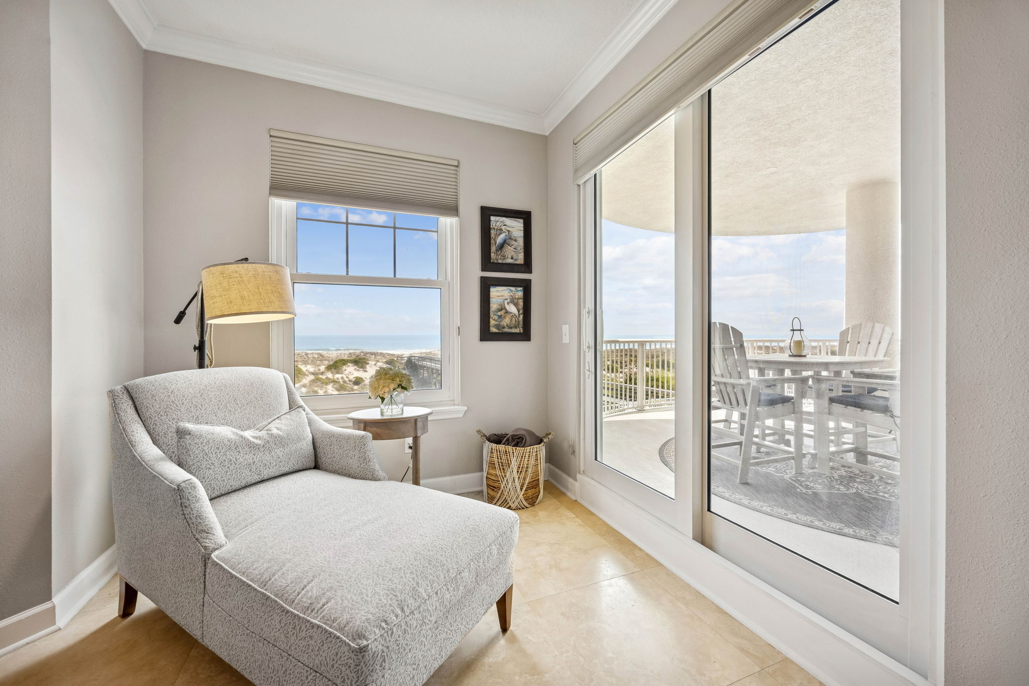 A sitting area by the window offers a quiet place to unwind ...