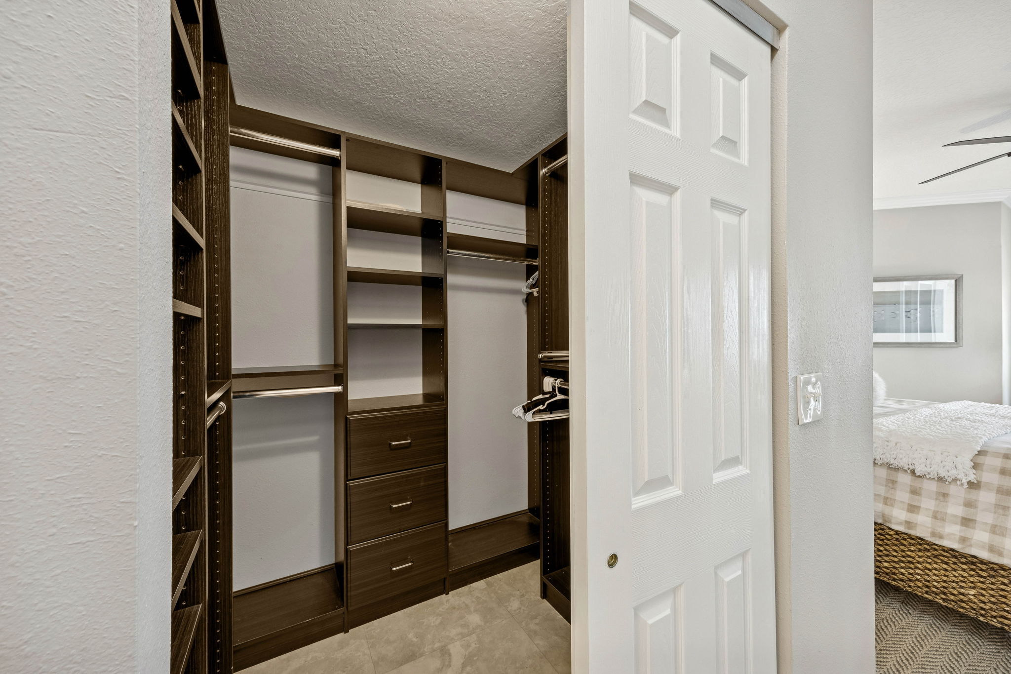 The customized walk-in closet is a standout upgrade ...