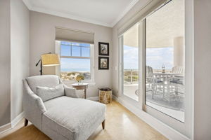 A sitting area by the window offers a quiet place to unwind ...