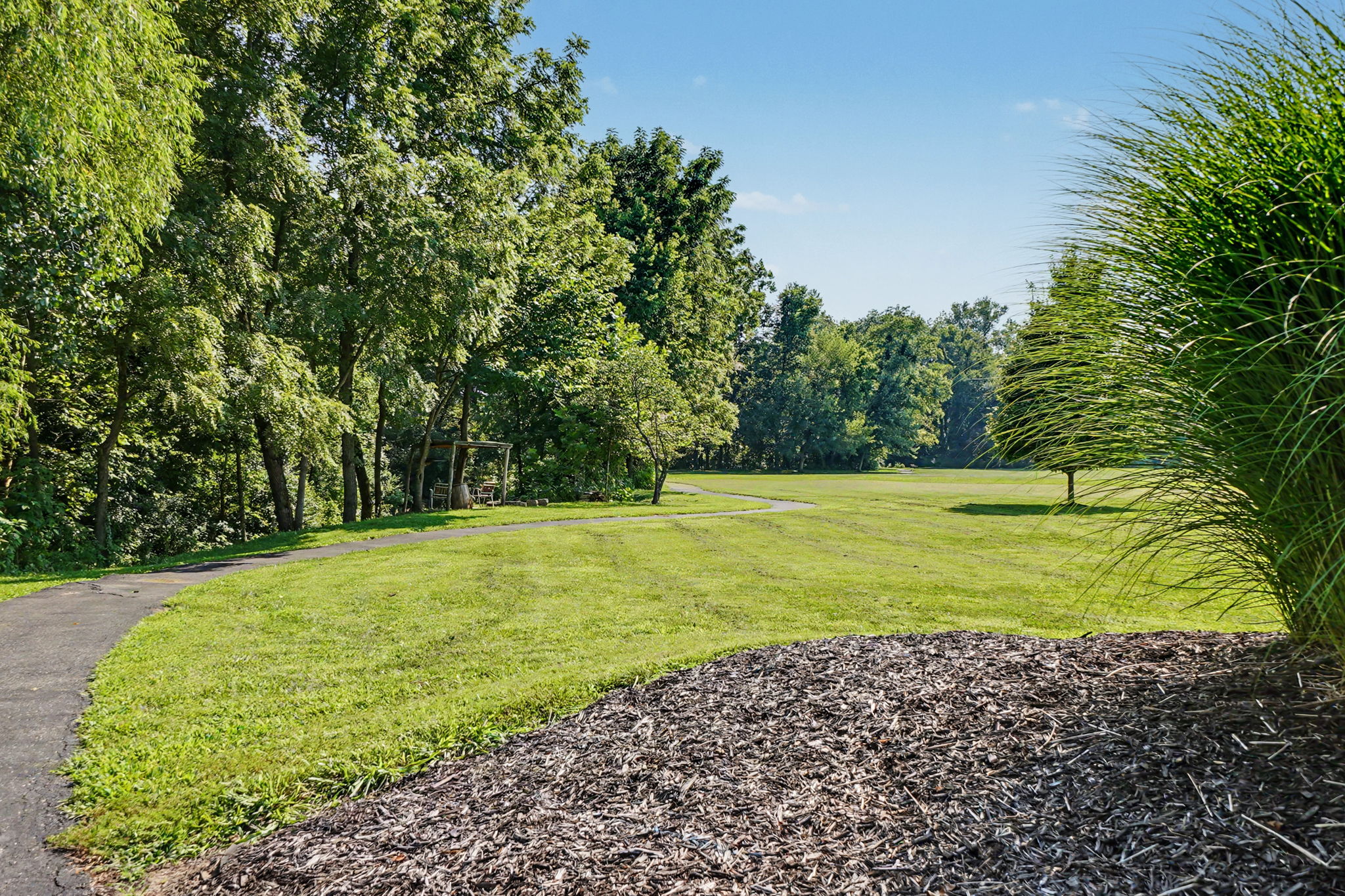 HOA features peaceful walking trails and community pool