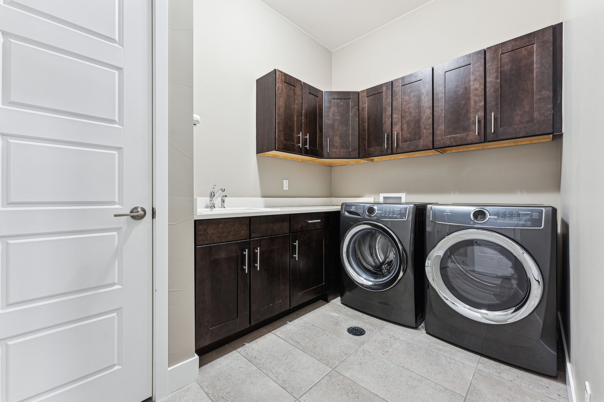 Laundry room with additional storage