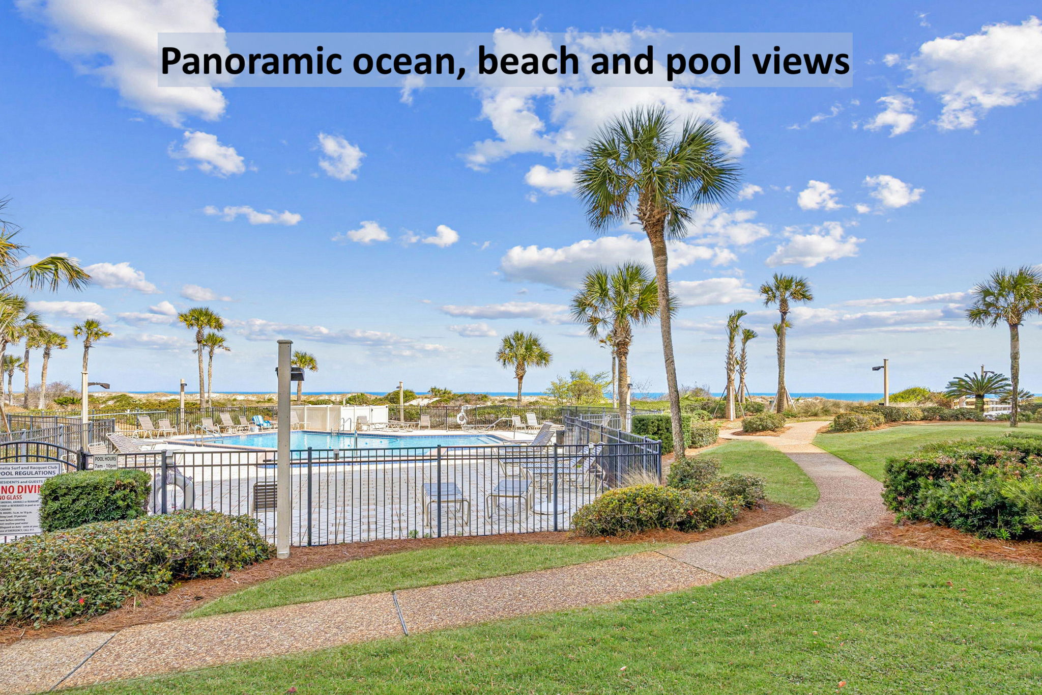 Enjoy pool, palm, and ocean views right from the unit ...