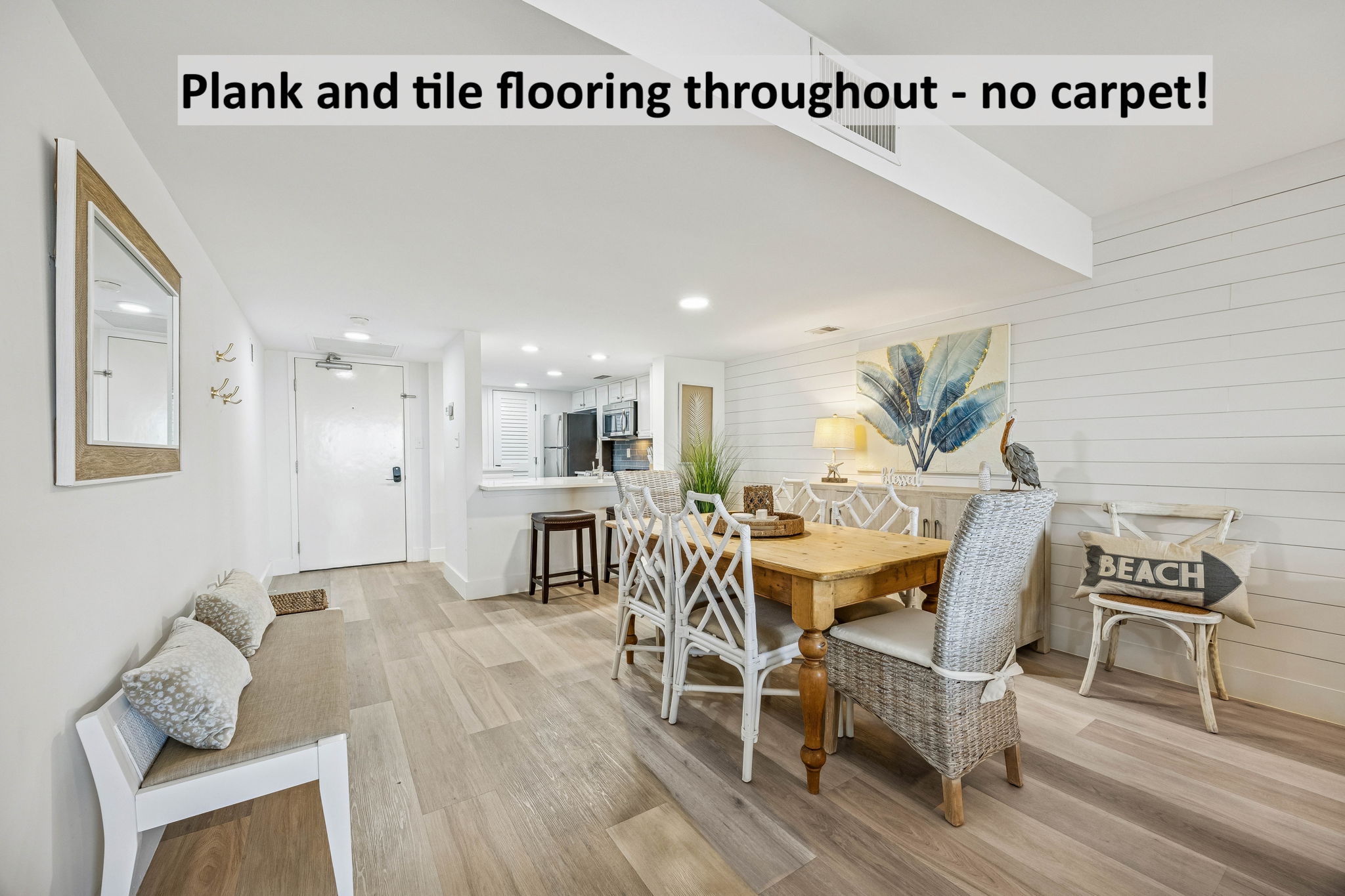 Plank and tile flooring throughout (no carpet!) adds a fresh, low-maintenance finish suited to beachside living ...