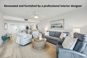 Inside, the condo has been thoughtfully renovated and professionally furnished with a clean coastal point of view ...