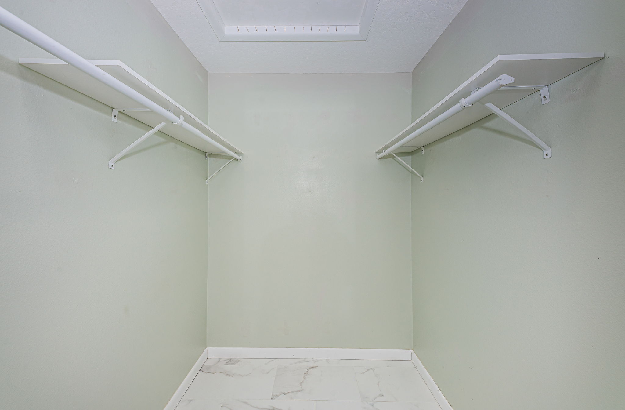 Primary Bedroom Walk-in Closet