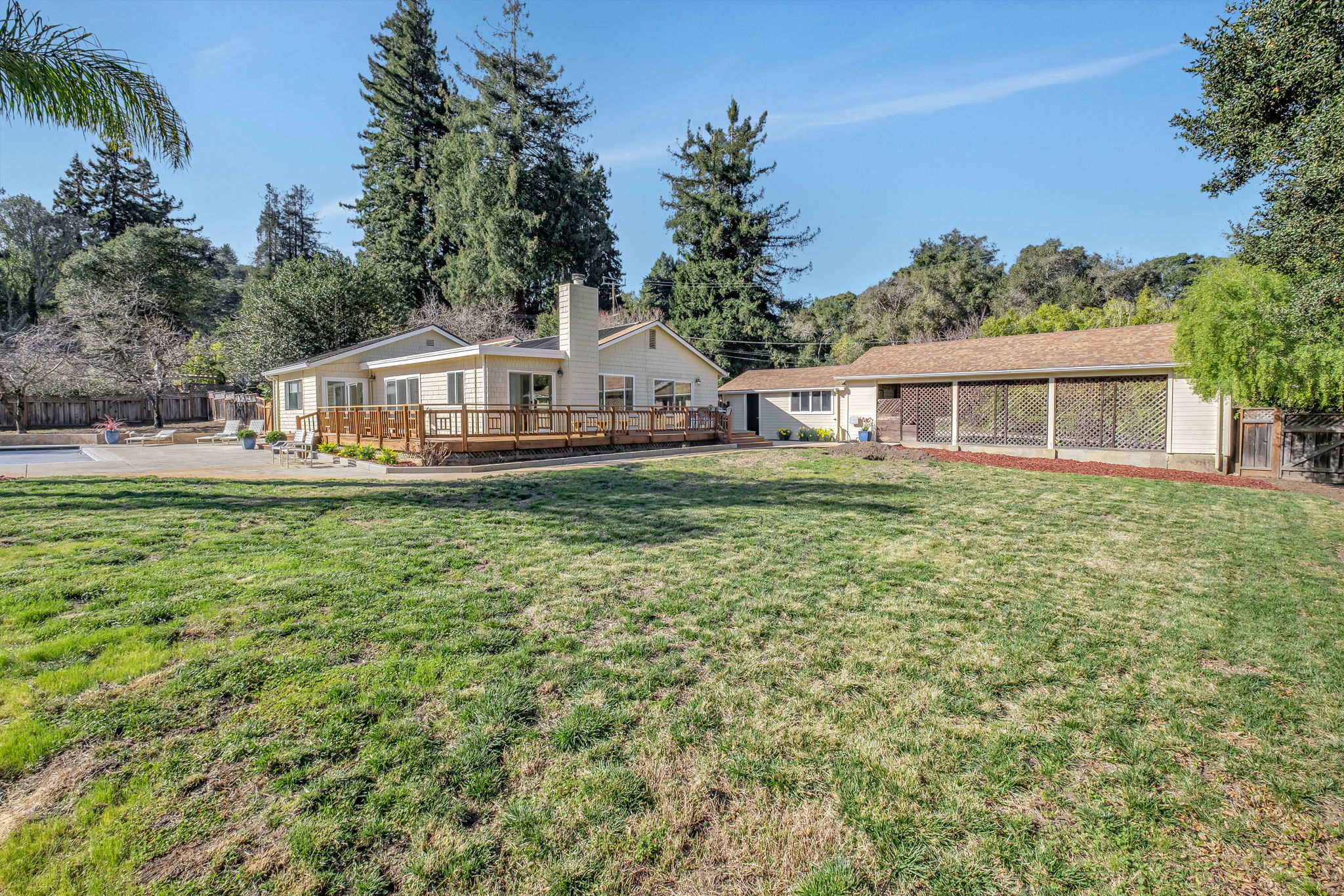 Back Yard wide angle w/ Carport