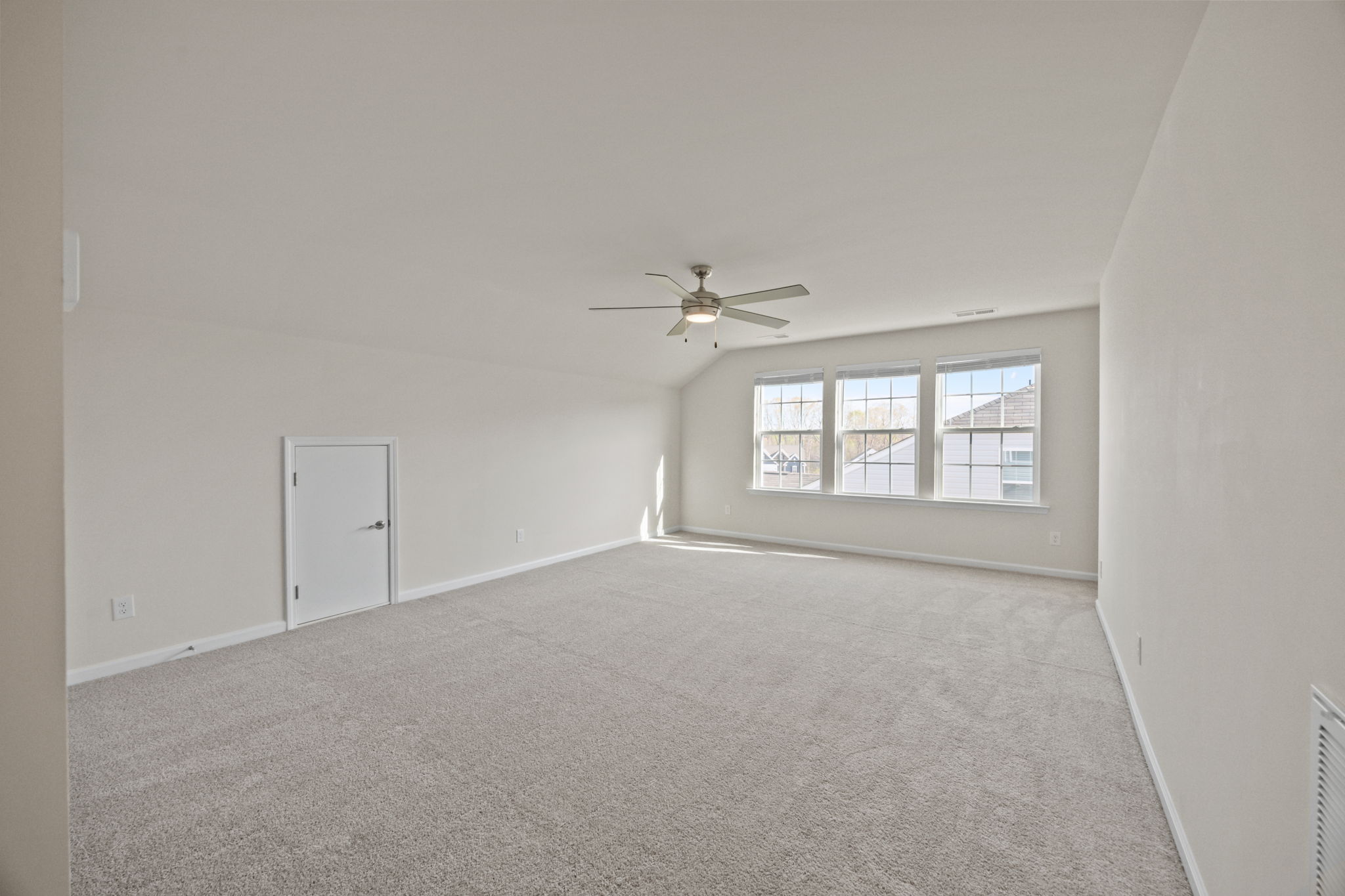 UPSTAIRS LIVING! Bright, large BONUS space for anything you wish! Small attic nook, large storage closet on other end of room AND a very large utility/storage walk-in closet room.  Just outside the UPSTAIRS bath and Bedroom/Office #3.