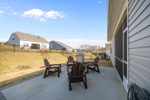 Enjoy this extra large extended patio and grill pad.