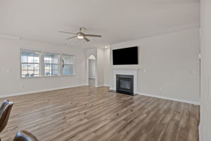 Breathtaking room to fill with your own style! Gas fireplace, wall-mounted TV, upgraded contemporary ceiling fans and beautiful window blinds throughout.  Plenty of room to enjoy entertaining or intimate spaces for a quiet retreat.