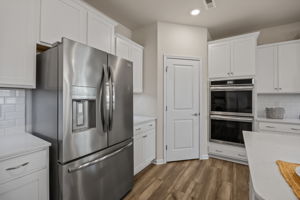 Top of the line Frigidaire Gallery Appliances! AND a large well-lit shelved pantry behind this center door.