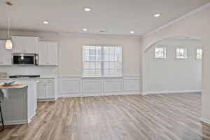 Architectural extra details! Look through arched doorway to additional space to be used as you wish!