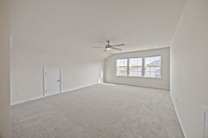 UPSTAIRS LIVING! Bright, large BONUS space for anything you wish! Small attic nook, large storage closet on other end of room AND a very large utility/storage walk-in closet room.  Just outside the UPSTAIRS bath and Bedroom/Office #3.