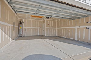 Insulated and drywalled, extra large garage!  PLUS BONUS storage room with pull down stairs!