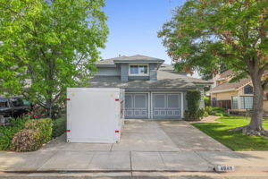 A moving pod currently is in front of the house