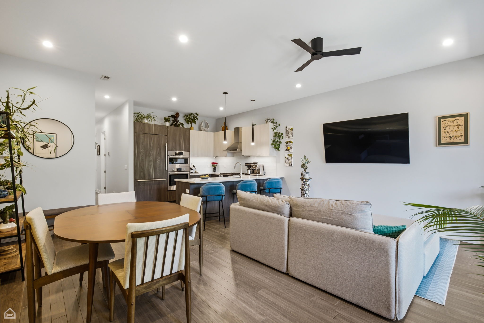 Natural bamboo wood floors throughout are beautiful yet durable enough to withstand the daily use