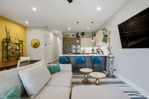 Delightful sunny living area, opens to large balcony