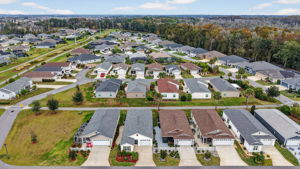 Aerial with Walking and Bicycling Trails Behind Home