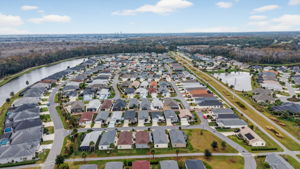 Aerial with Walking and Bicycling Trails Behind Home