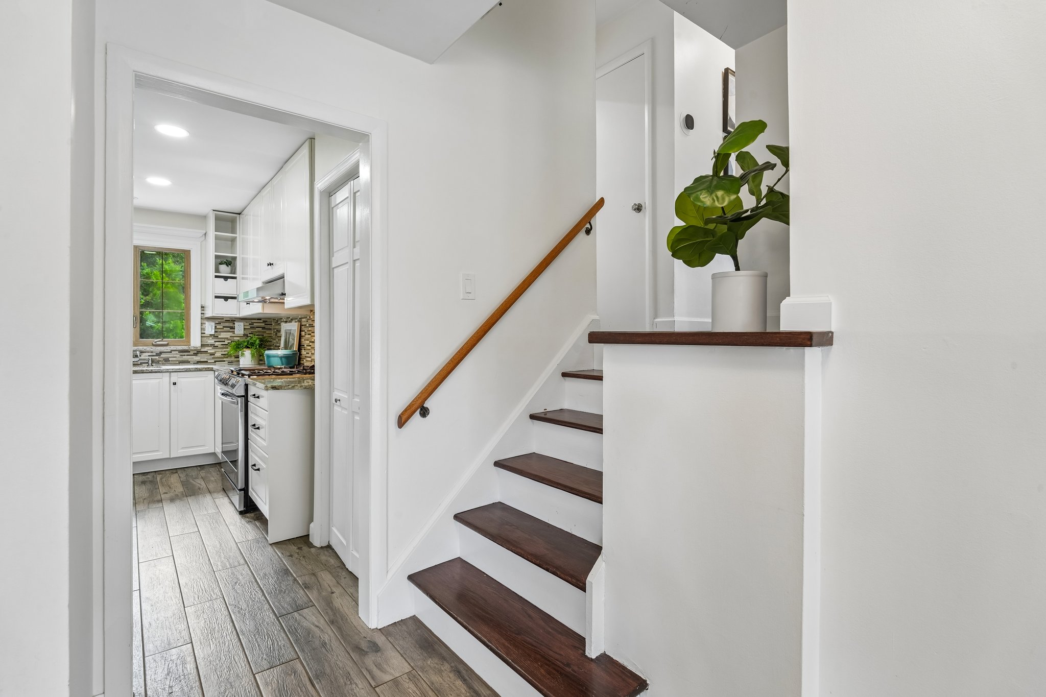 Step Upstairs from Kitchen to the 2nd floor