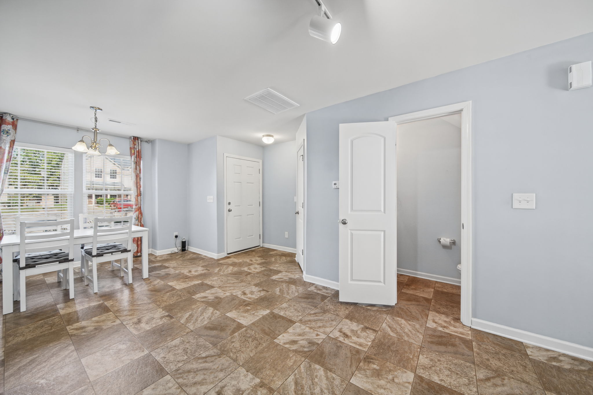 View of Dining Area and Entry Way