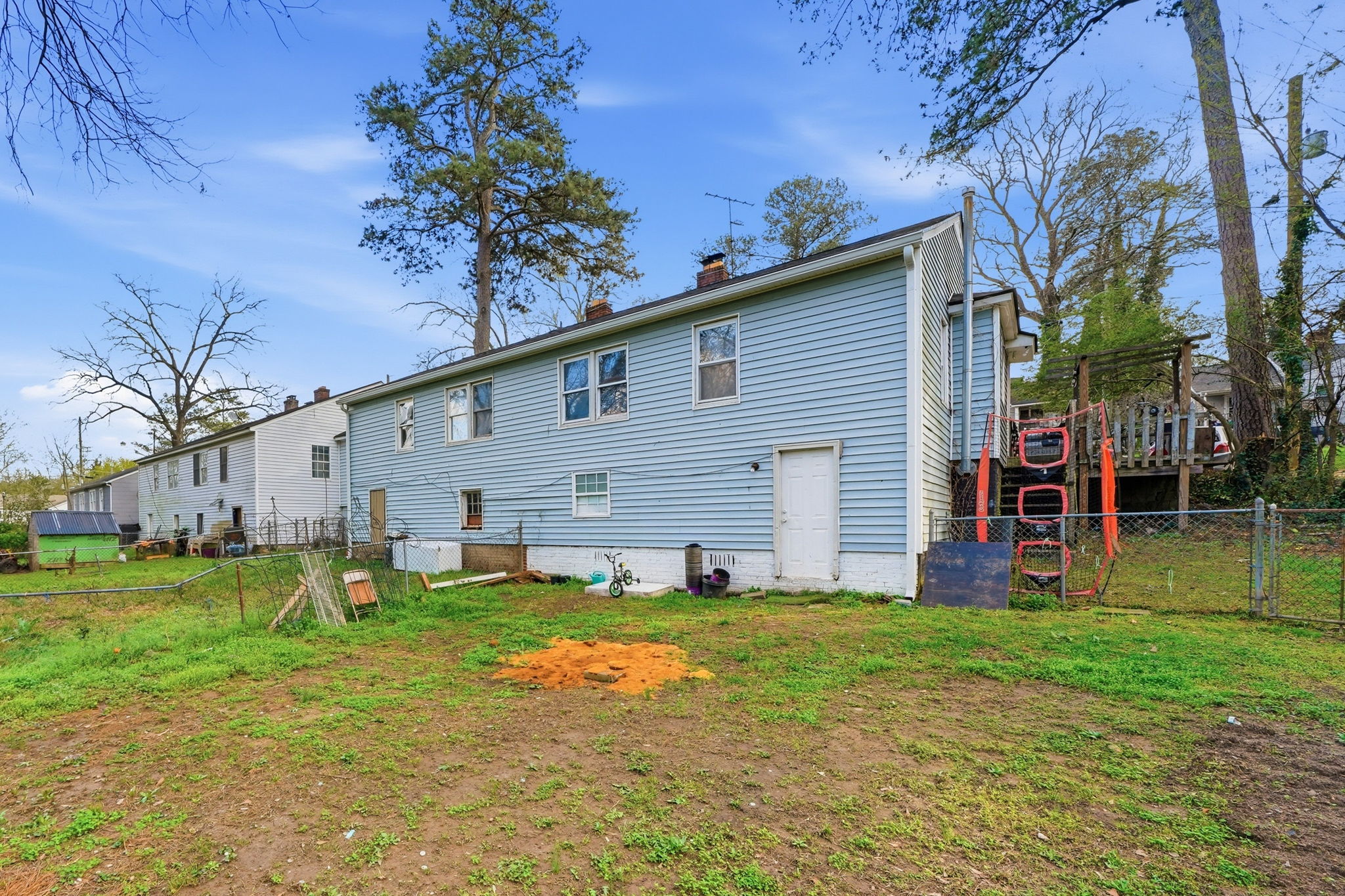View of basement door of 495 Birney and deck