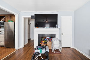 Fireplace works and door to right goes into basement