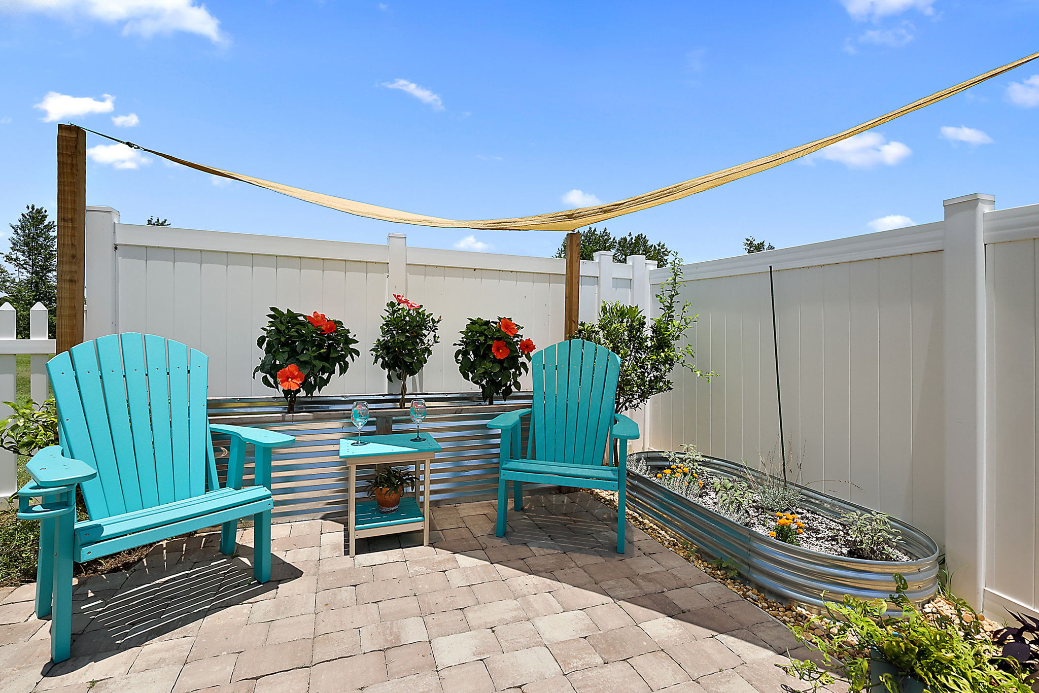 Cute Paved Patio w/ Garden Boxes