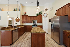 Kitchen w/ Granite & Stainless Appliances