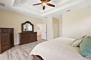 Dual Walk-In Closets w/ Built-in Shelving